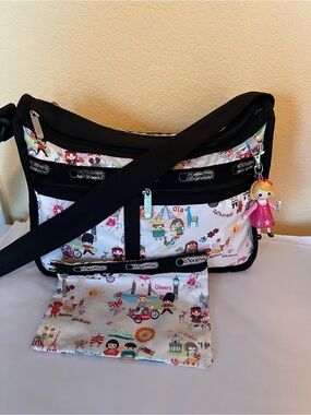 Lesportsac X Disney It’s A Small World “Well Wishes” Deluxe Everyday Bag w/charm
